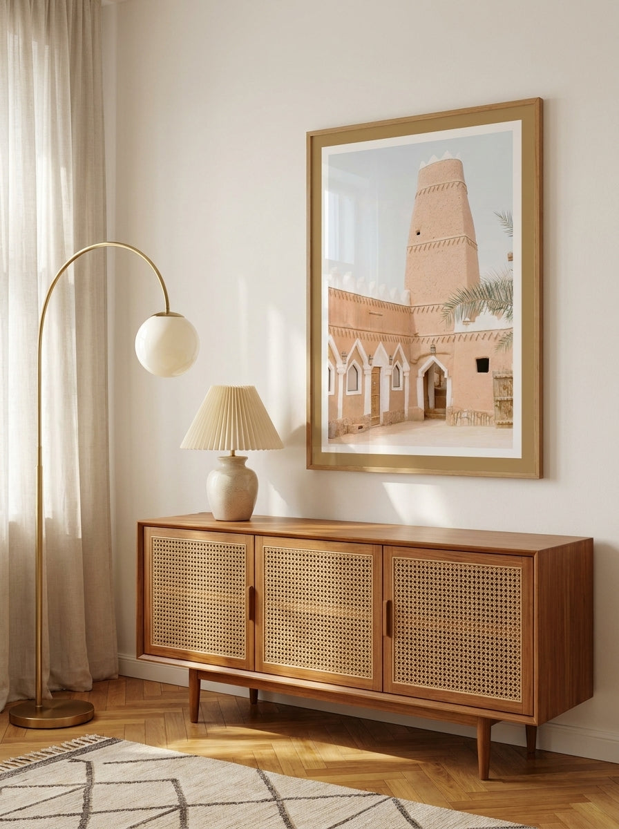 Modern wall art print styled on the wall in a mid-century living room