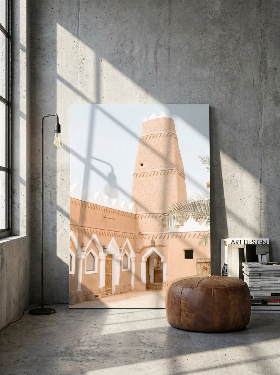 Stretched canvas wall art leaning against the wall in an industrial loft bedroom