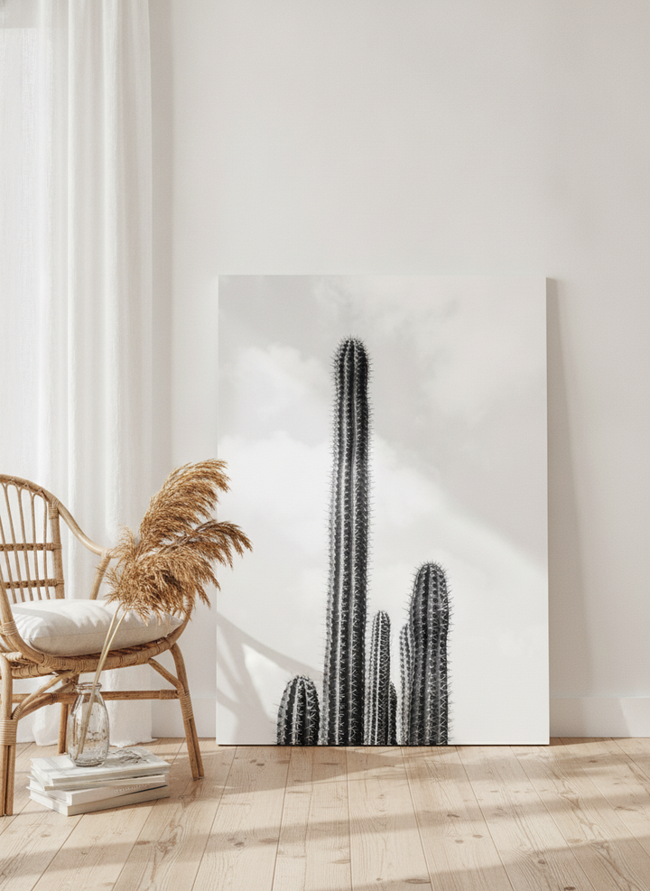 Stretched canvas wall art leaning against the wall in a coastal home office