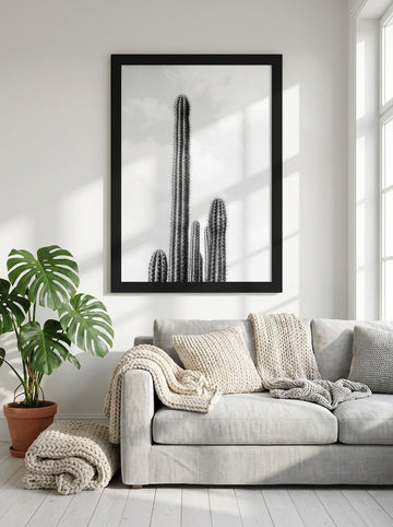 Modern wall art print styled on the wall in a bright Scandinavian living room