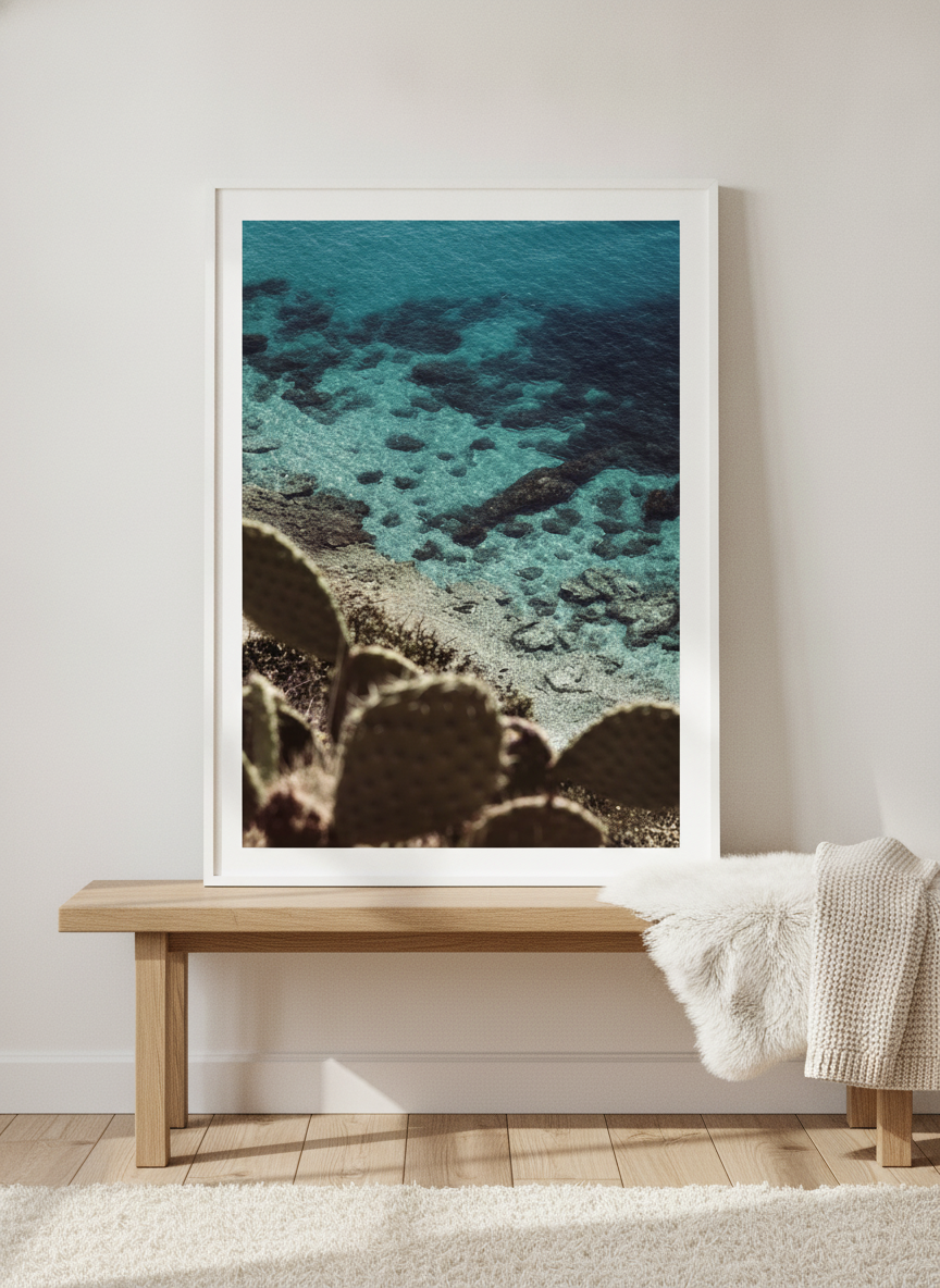 Modern wall art print standing on a bench in a bright Scandinavian bathroom
