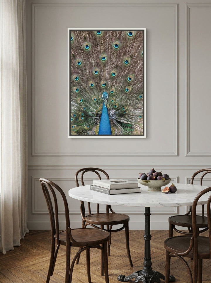 Canvas wall art with a white surround styled on the wall in a Parisian dining room