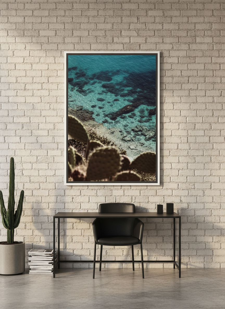 Canvas wall art with a white surround styled on the wall in an industrial loft home office