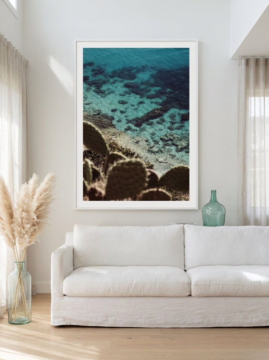 Oversized statement modern wall art print styled on the wall in a coastal living room