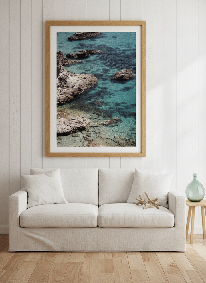 Modern wall art print styled on the wall in a coastal living room