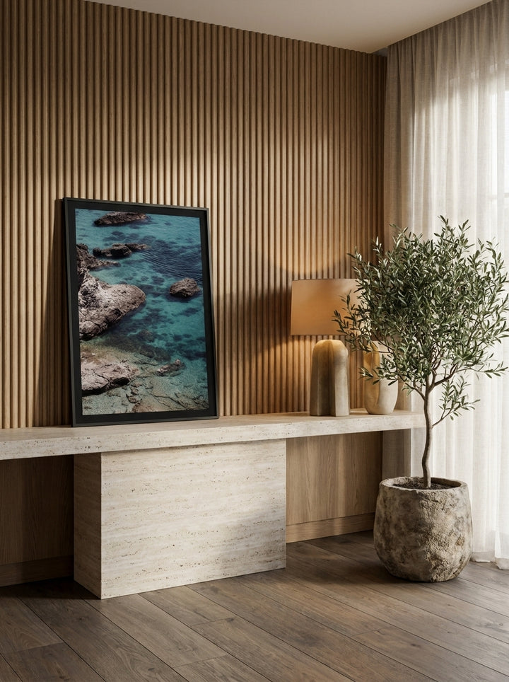 Modern wall art print standing on a console in a luxe home office