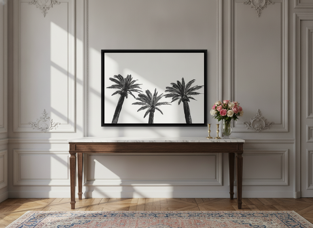 Canvas wall art with a black surround standing on a console in a Parisian living room