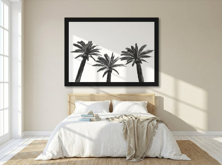 Oversized statement modern wall art print styled on the wall in a coastal bedroom