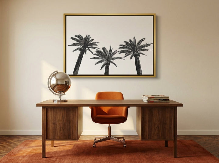 Canvas wall art with a gold leaf surround styled on the wall in a retro 70s home office