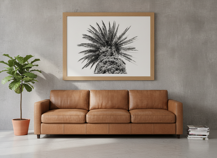 Modern wall art print styled on the wall in an industrial loft living room