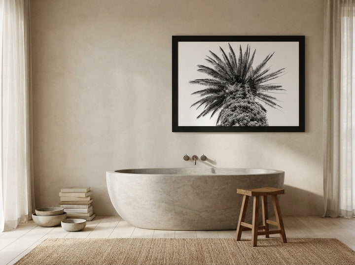 Modern wall art print styled on the wall in a warm Japandi bathroom