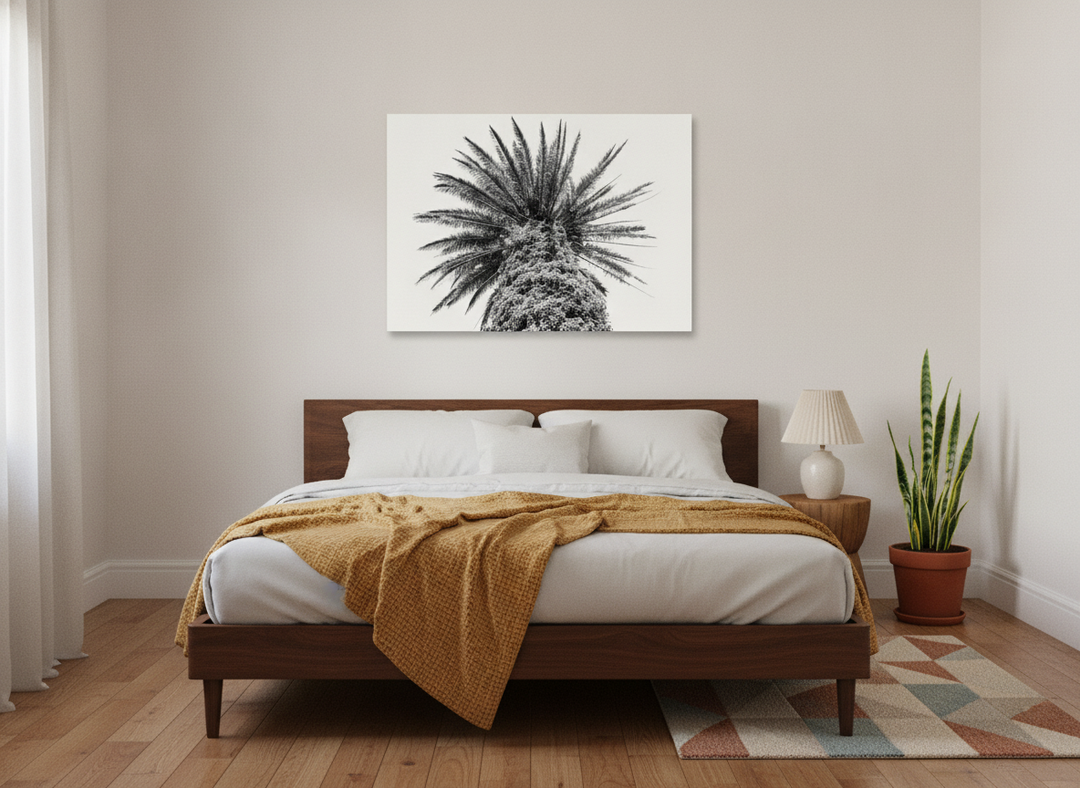 Stretched canvas wall art styled on the wall in a mid-century bedroom