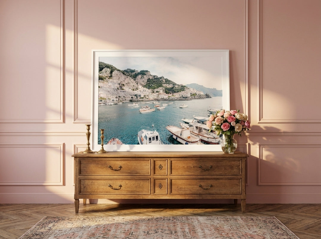 Modern wall art print standing on a sideboard in a Parisian bedroom