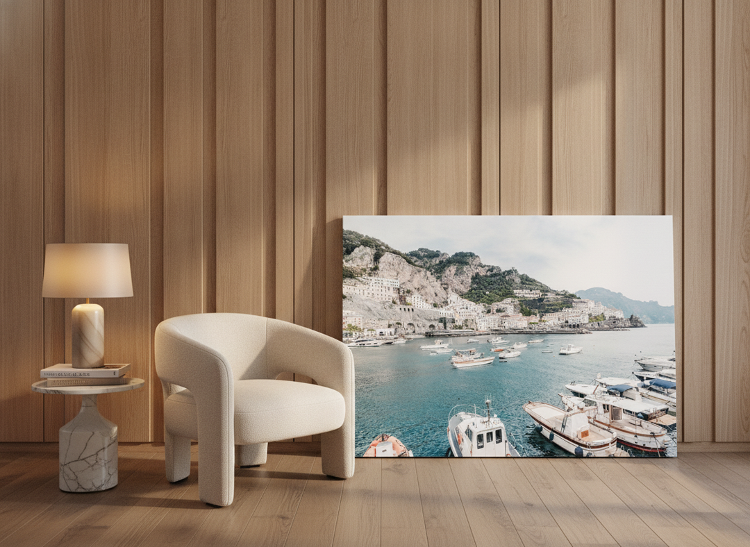Stretched canvas wall art leaning against the wall in a luxe home office