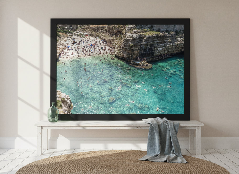 Modern wall art print standing on a console in a coastal home office