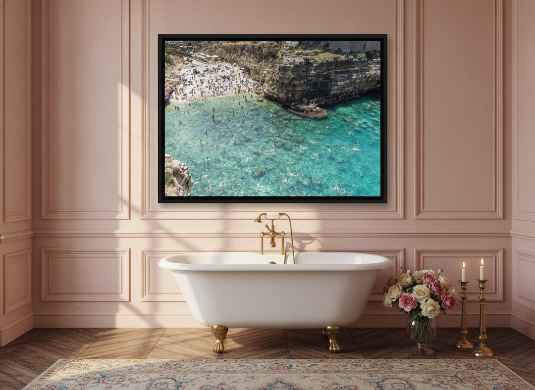 Canvas wall art with a black surround styled on the wall in a Parisian bathroom