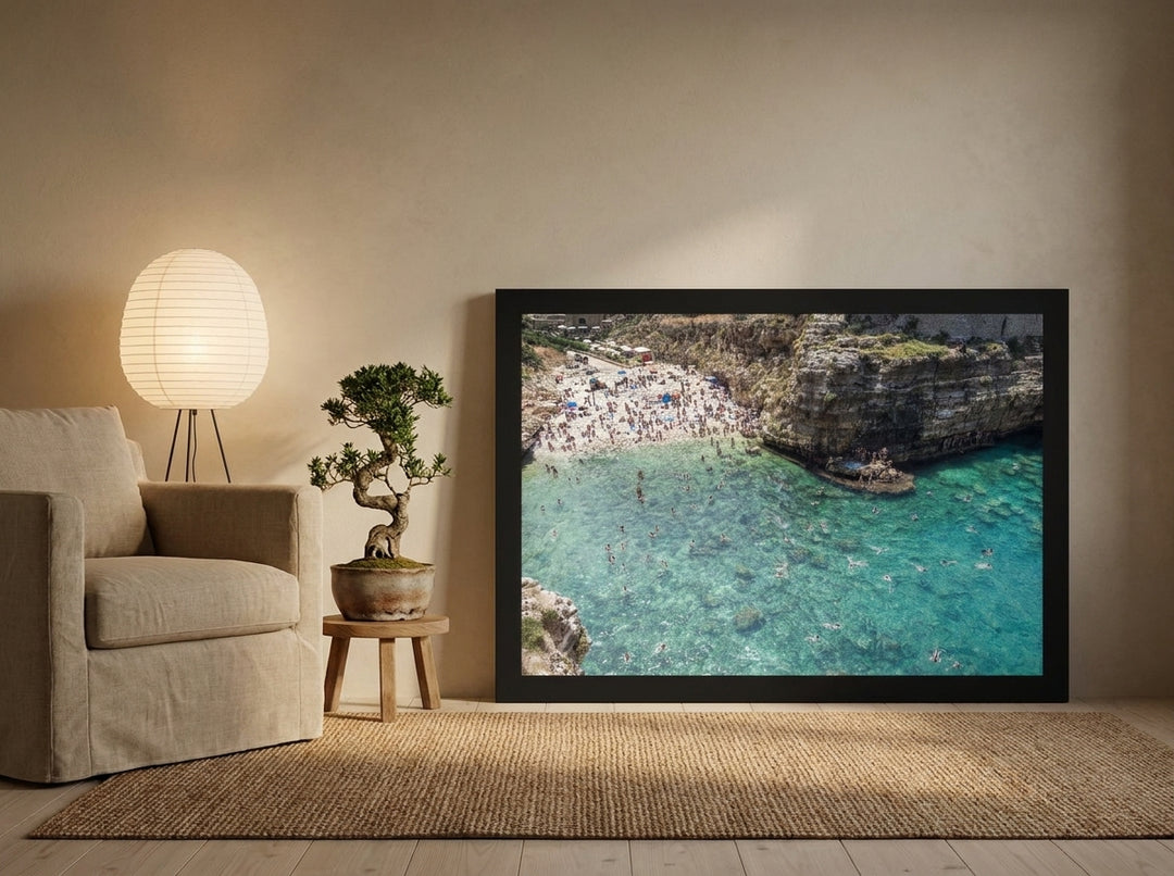 Modern wall art print leaning against the wall in a warm Japandi bedroom