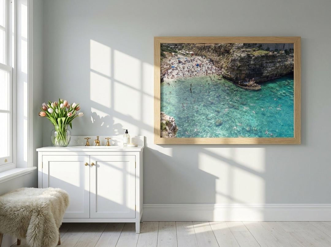 Modern wall art print styled on the wall in a bright Scandinavian bathroom