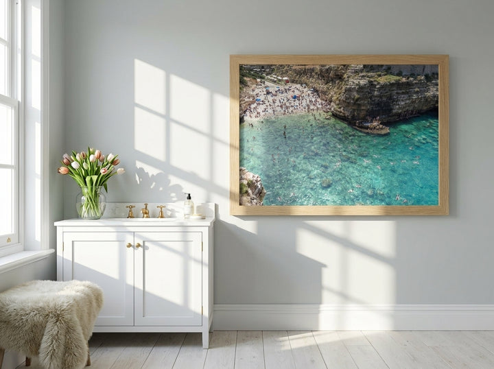 Modern wall art print styled on the wall in a bright Scandinavian bathroom