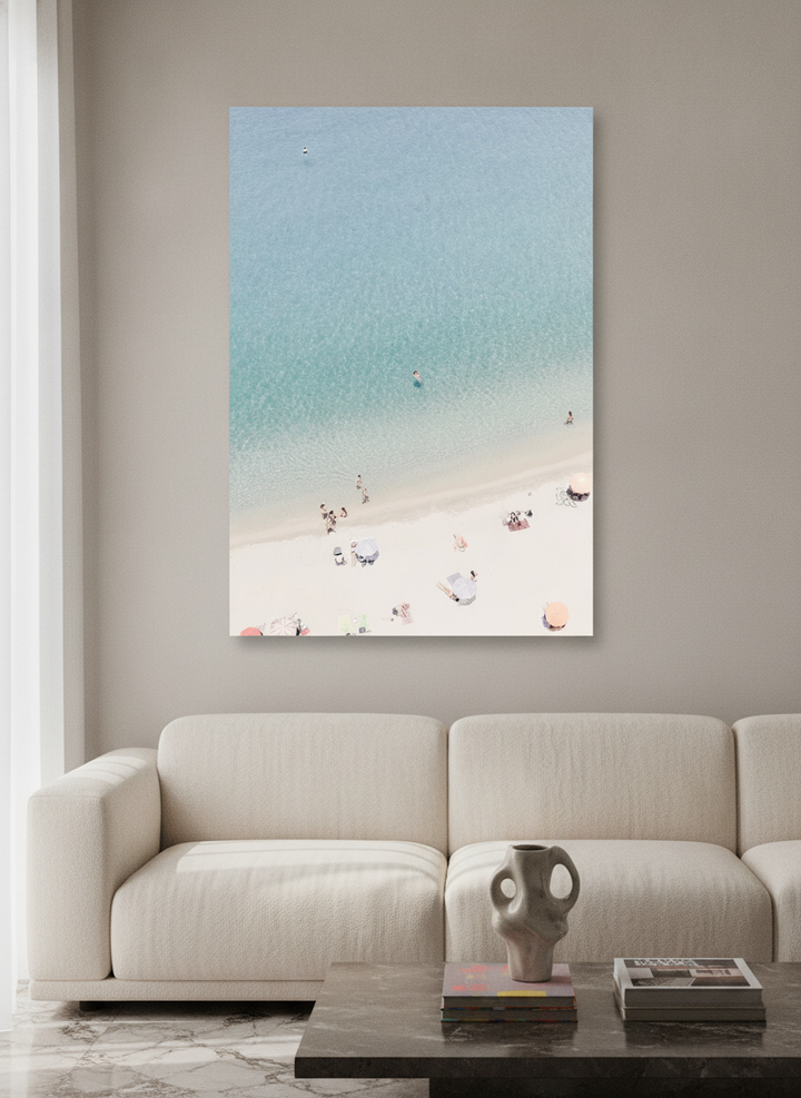 Stretched canvas wall art styled on the wall in a luxe living room