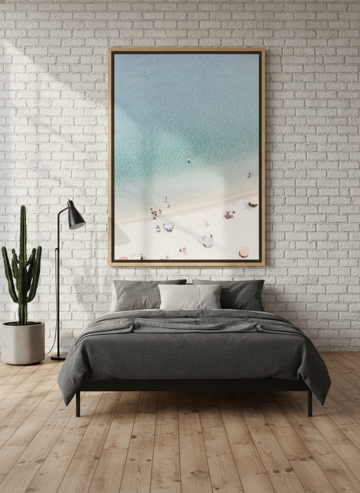 Oversized statement canvas wall art with a natural timber surround styled on the wall in an industrial loft bedroom
