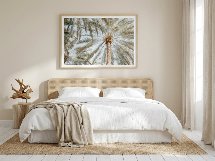 Modern wall art print styled on the wall in a coastal bedroom
