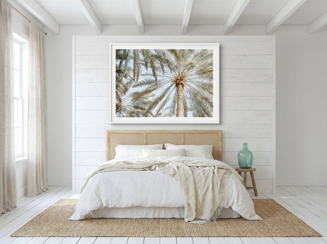 Oversized statement modern wall art print styled on the wall in a coastal bedroom