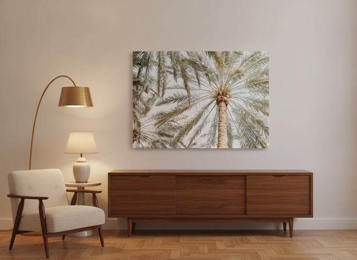 Stretched canvas wall art styled on the wall in a mid-century living room