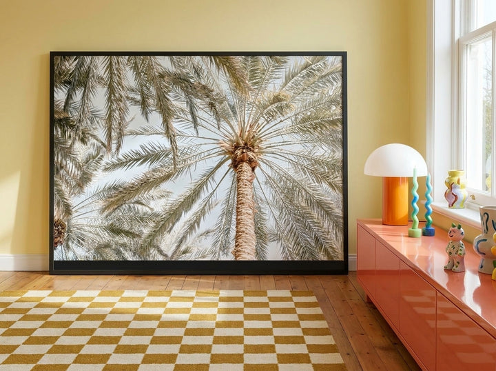 Modern wall art print standing on a sideboard in a colourful eclectic home office