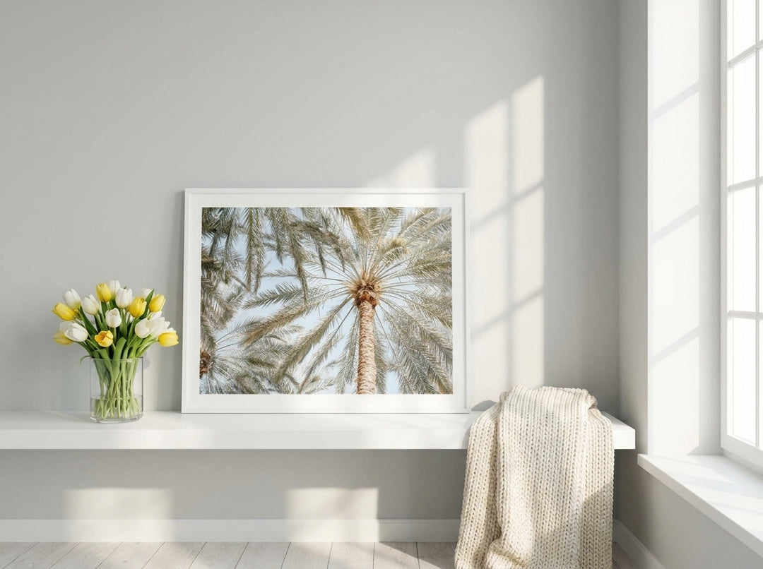 Modern wall art print standing on a shelf in a bright Scandinavian bedroom