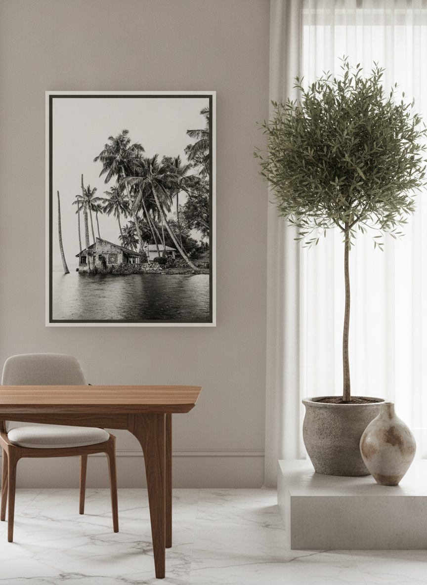 Canvas wall art with a white surround styled on the wall in a luxe home office