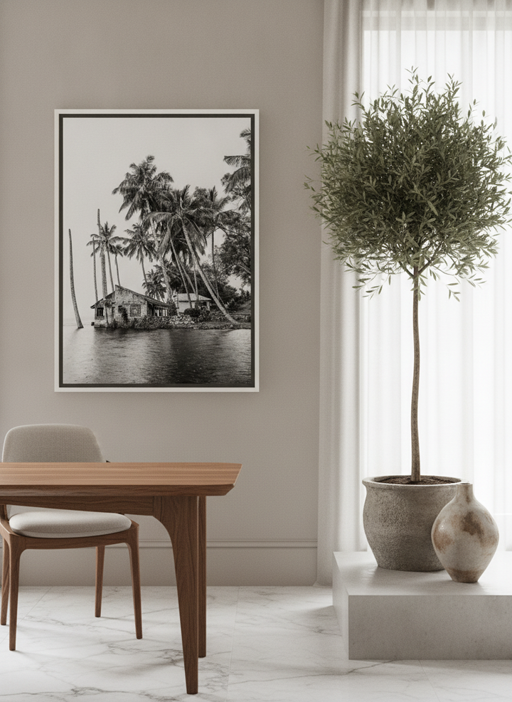 Canvas wall art with a white surround styled on the wall in a luxe home office