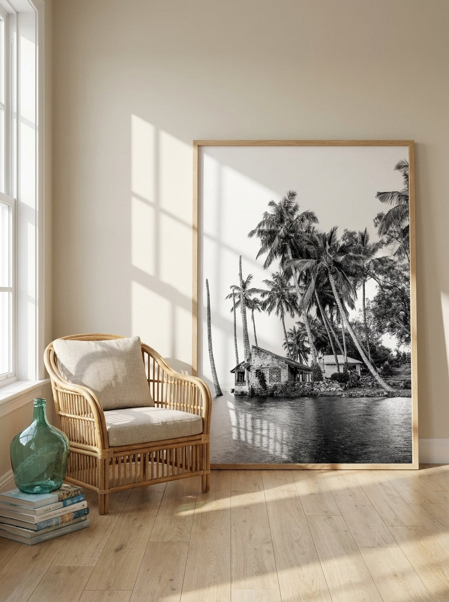 Oversized statement modern wall art print leaning against the wall in a coastal living room