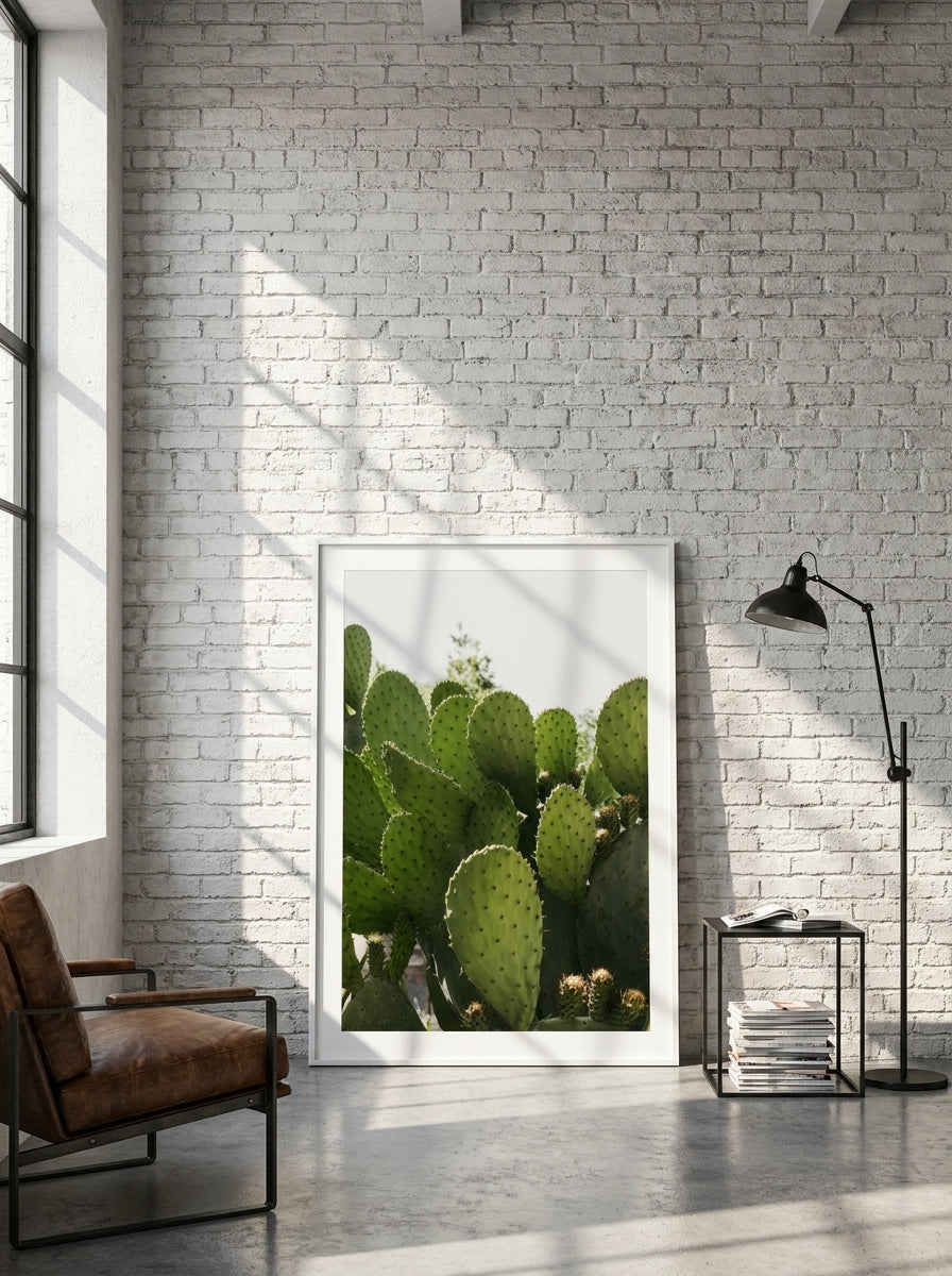 Oversized statement modern wall art print leaning against the wall in an industrial loft living room