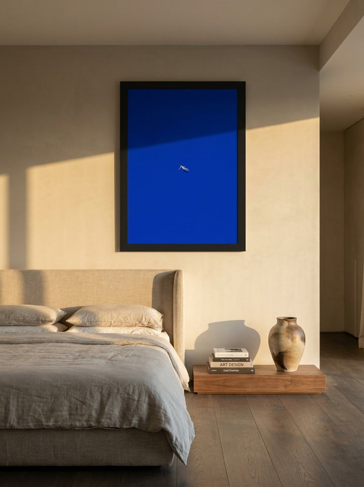 Oversized statement modern wall art print styled on the wall in a luxe bedroom