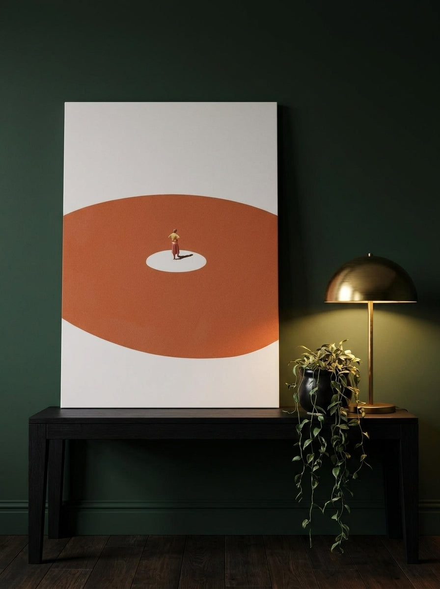 Stretched canvas wall art standing on a console in a moody home office