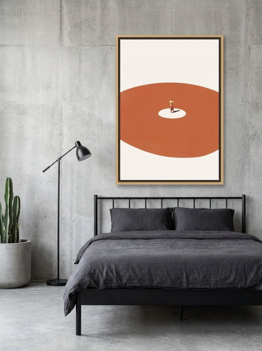Canvas wall art with a natural timber surround styled on the wall in an industrial loft bedroom