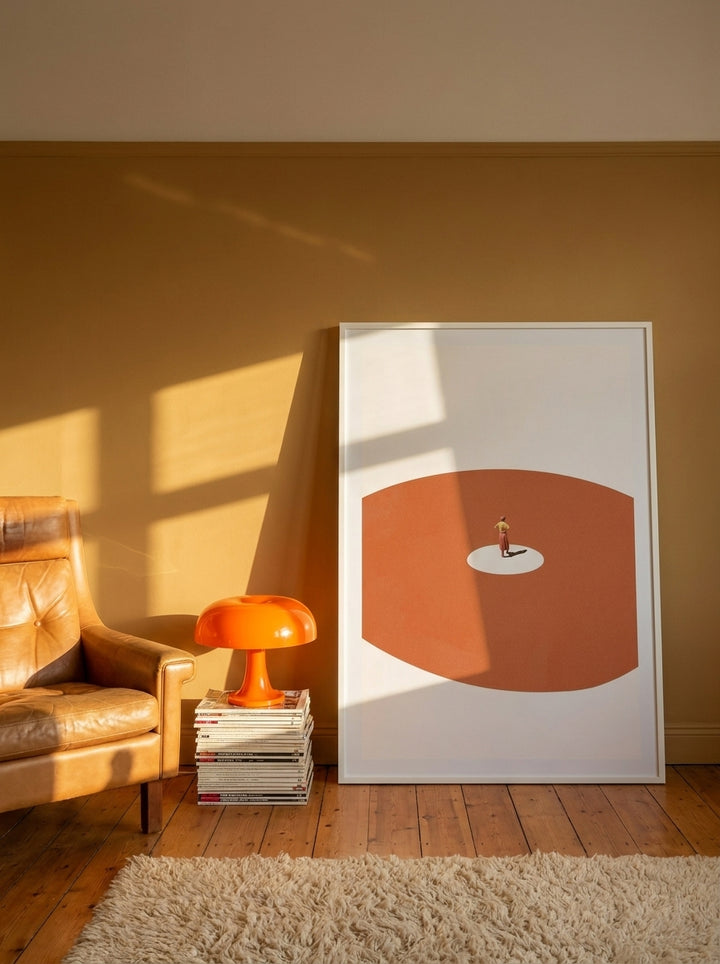 Oversized statement modern wall art print leaning against the wall in a retro 70s living room