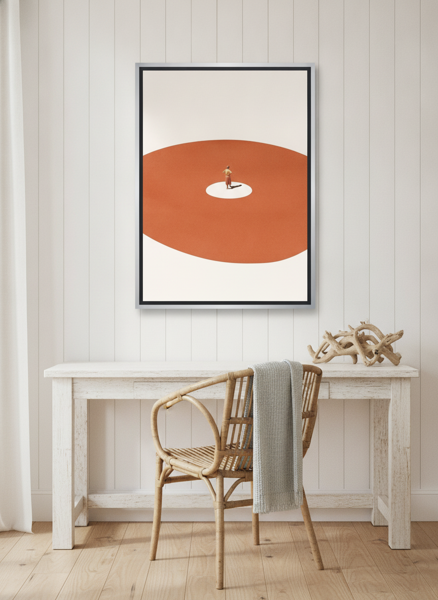 Canvas wall art with a silver leaf surround styled on the wall in a coastal home office