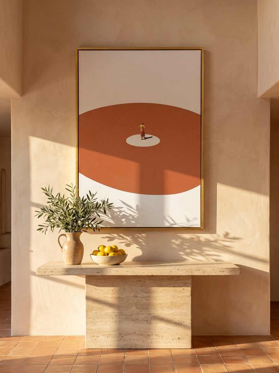 Oversized statement canvas wall art with a gold leaf surround styled on the wall in a Mediterranean living room