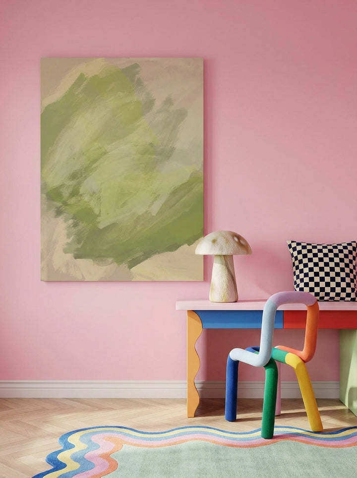 Stretched canvas wall art styled on the wall in a colourful eclectic home office