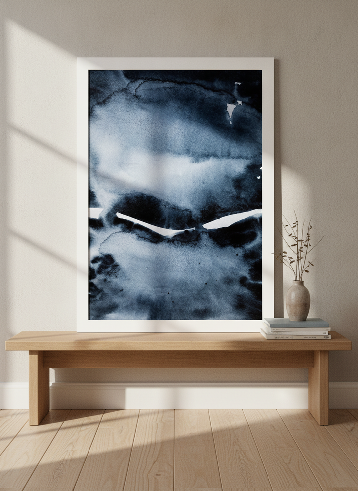 Modern wall art print standing on a bench in a warm Japandi home office