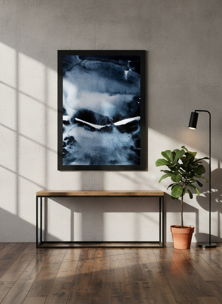 Modern wall art print styled on the wall in an industrial loft living room