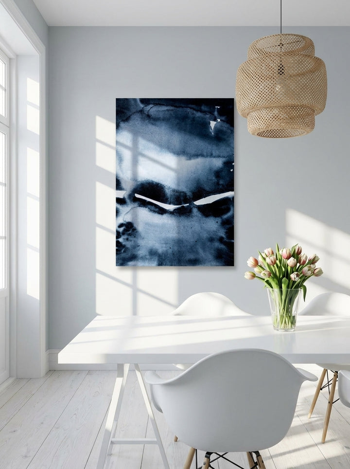 Stretched canvas wall art styled on the wall in a bright Scandinavian home office