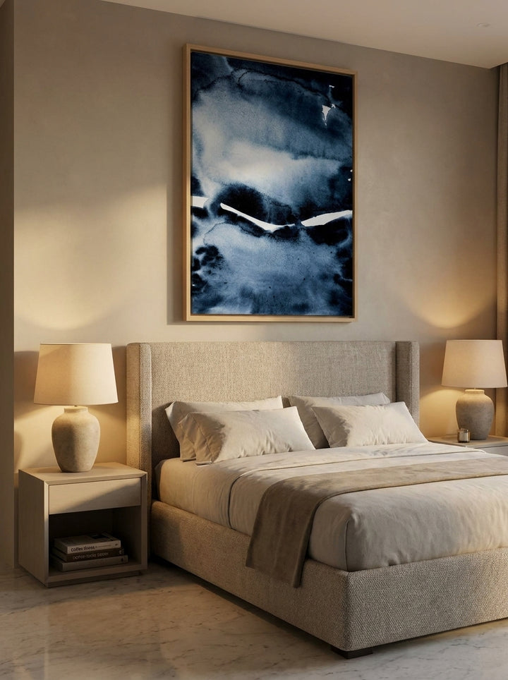 Oversized statement canvas wall art with a natural timber surround styled on the wall in a luxe bedroom