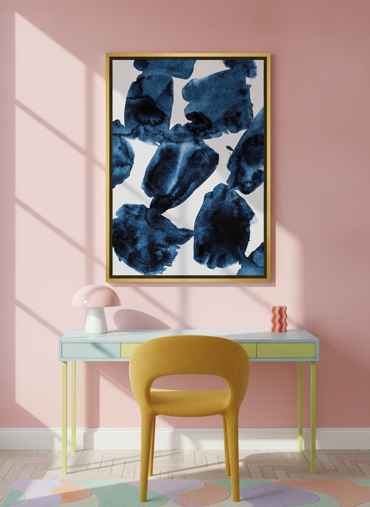 Canvas wall art with a gold leaf surround styled on the wall in a colourful eclectic home office