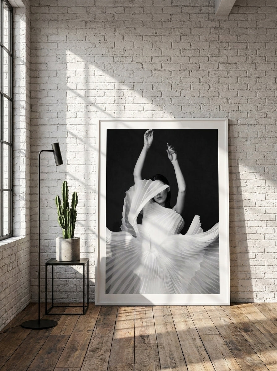 Oversized statement modern wall art print leaning against the wall in an industrial loft bedroom