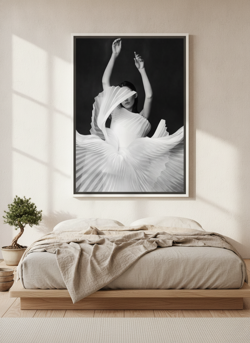 Canvas wall art with a white surround styled on the wall in a warm Japandi bedroom