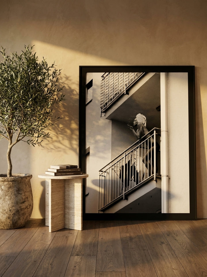 Oversized statement modern wall art print leaning against the wall in a luxe living room