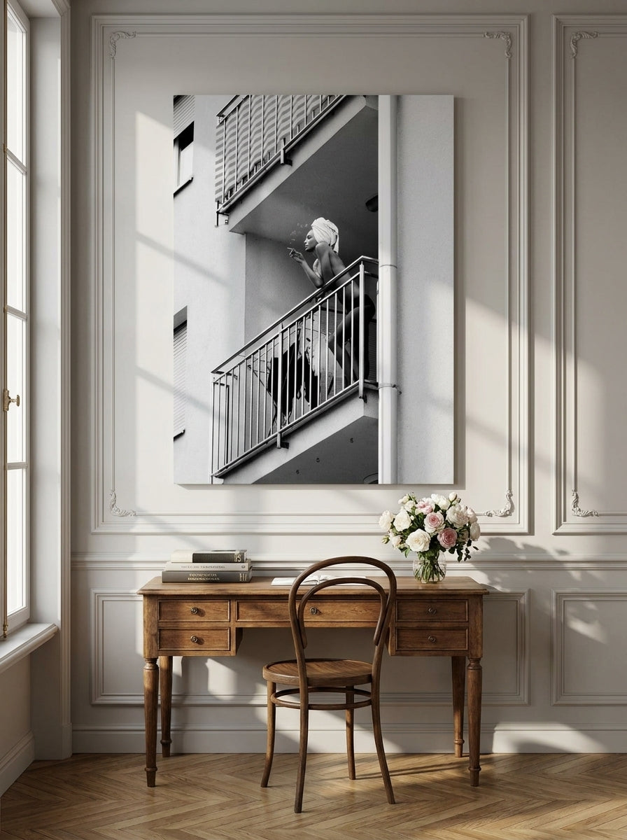 Stretched canvas wall art styled on the wall in a Parisian home office